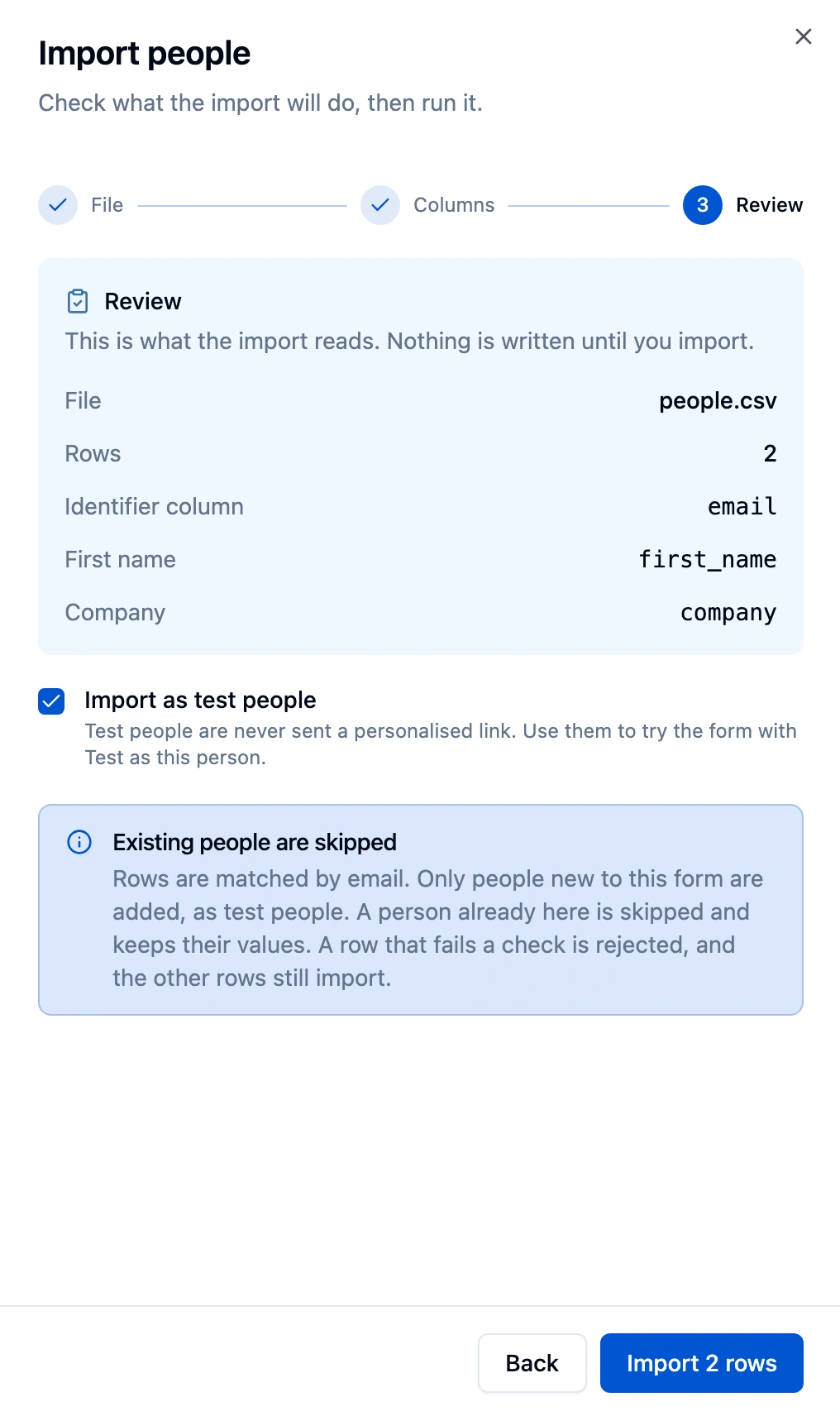 Import people panel on the Review step with Import as test people selected and the note Existing people are skipped